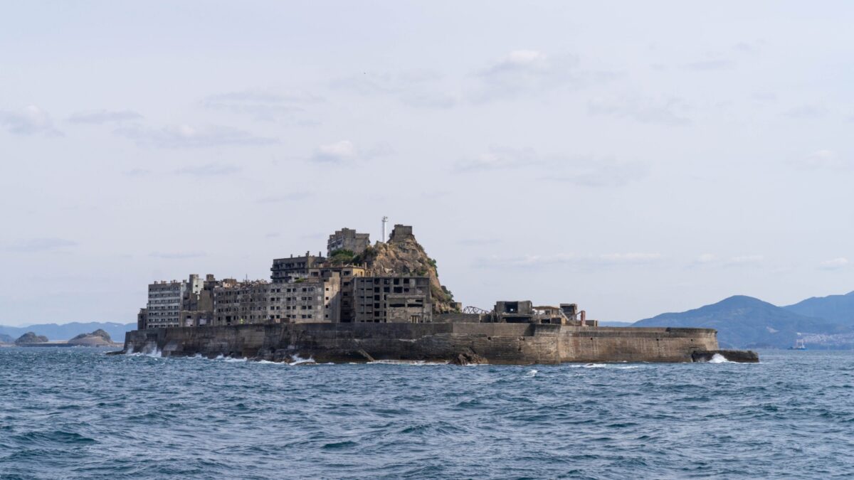 Hashima Island in Nagasaki, Japan. Also called Battleship Island. A symbol of the rapid industrialization of Japan. It is a UNESCO World Heritage site.