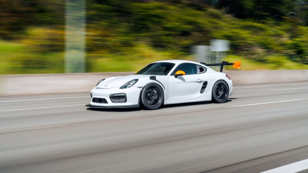 Seattle, WA, USA May 5, 2024 Porsche Cayman GTS driving on the street