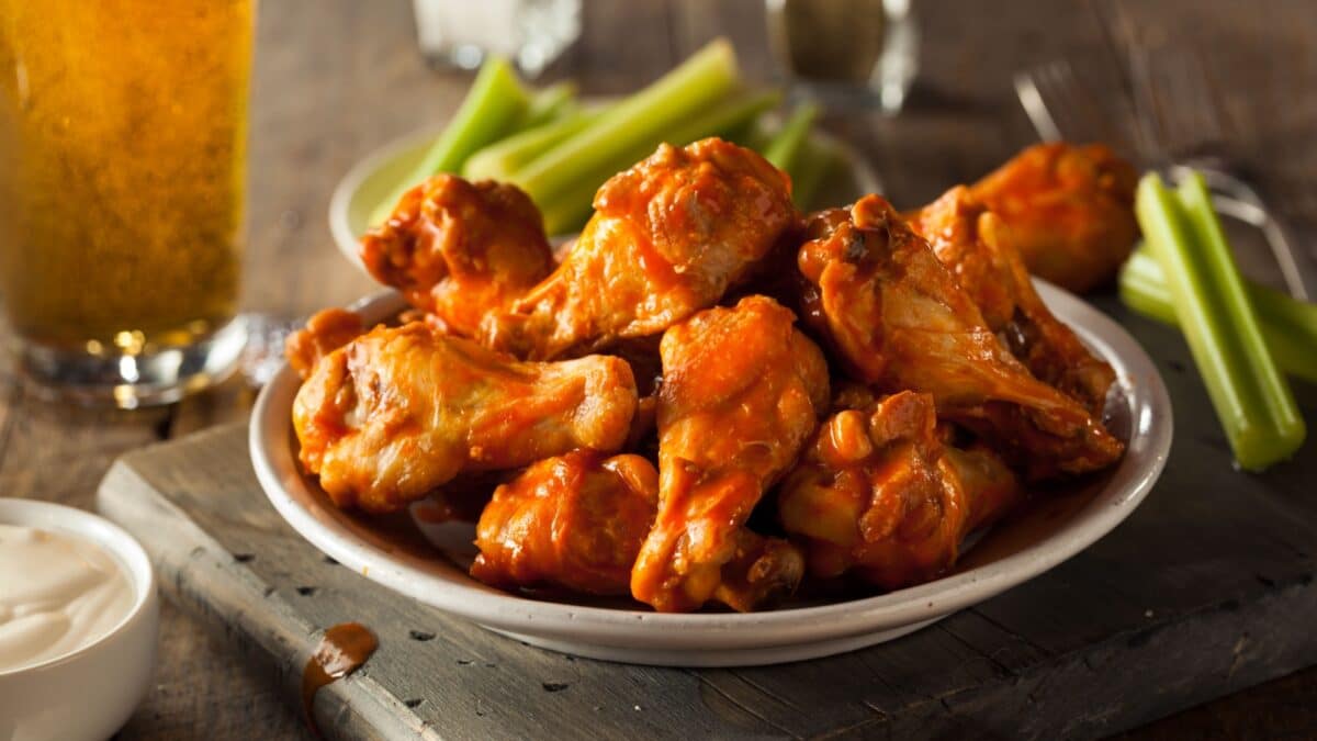 Spicy Homemade Buffalo Wings with Dip and Beer