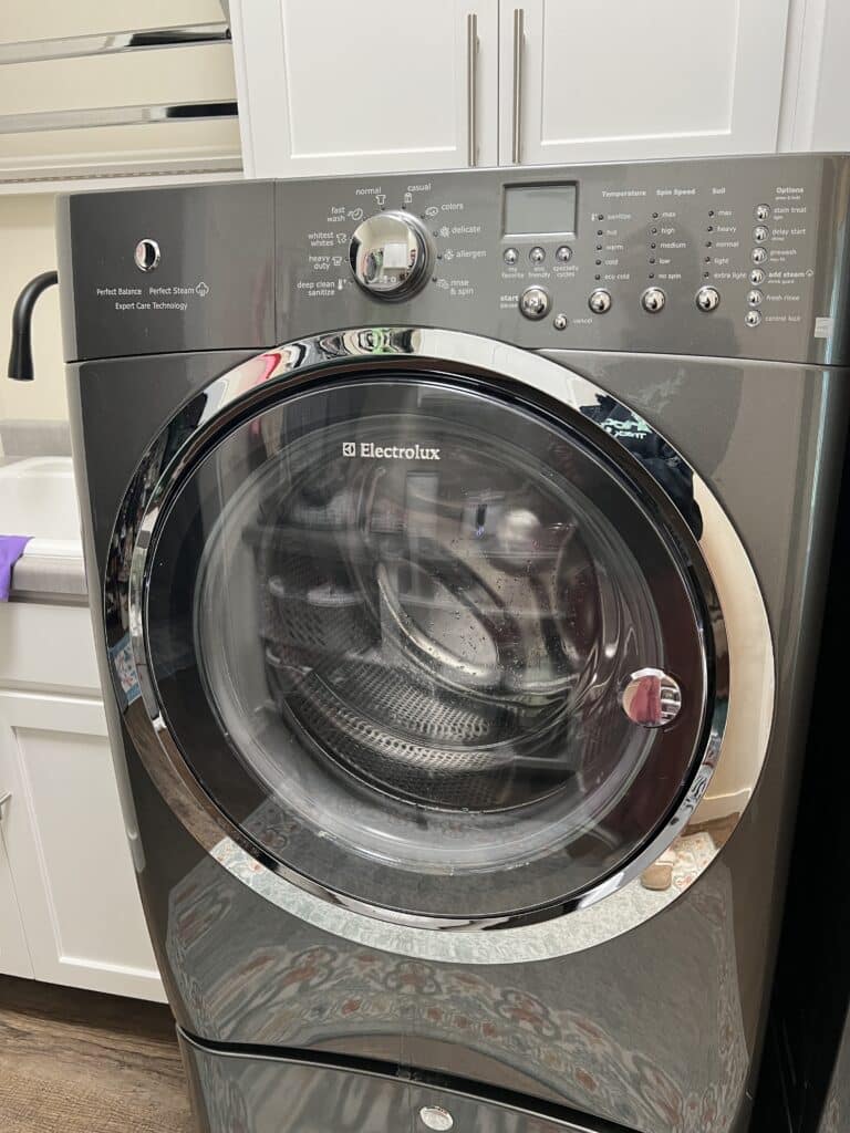 An electrolux washing machine, silver