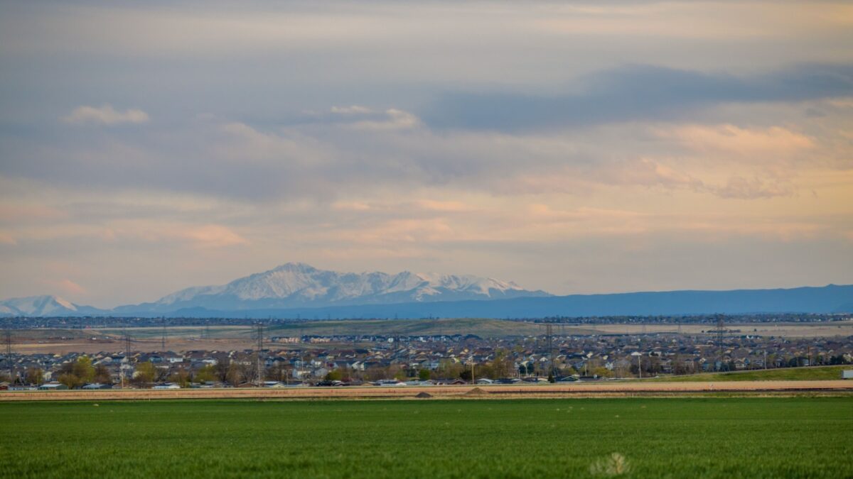 Colorado Living. Aurora, Colorado - Denver Metro Area Residential Panorama with the view of a Pikes Peak mountain in the distance